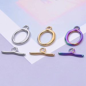 Polished stainless steel OT toggle clasps set in gold, silver, and rainbow finishes