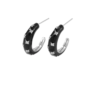 Minimalist C-shape hoop earrings with black enamel and silver star patterns