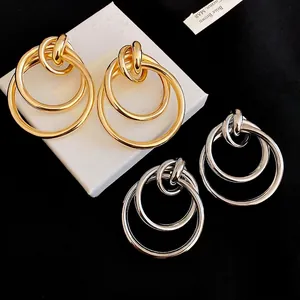 Boucles d'oreilles nœuds à trois cercles en or et argent, design rétro chic