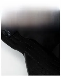 Macro detail of the 100% cotton sweatband and premium stitching on this black baseball cap