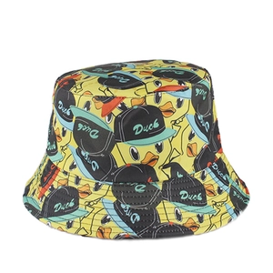 Bright yellow bucket hat featuring repeated cartoon duck patterns in a streetwear style