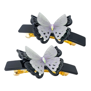 Double-layered butterfly hair claw clip with purple gradient finish and rhinestone accents
