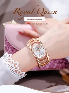 Close-up of Gedi women's bracelet watch featuring a rose gold hollow metal strap and white dial