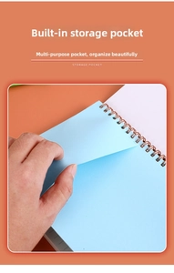Detail of the built-in light blue storage pocket and sturdy double-wire binding of the A5 notebook