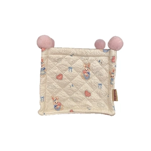 Quilted desktop storage basket with cute bunny prints and pink pom-pom corner details