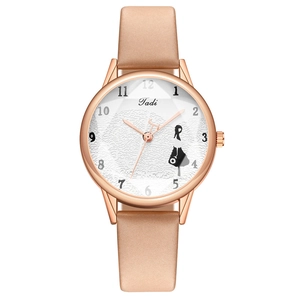 Detail of rose gold case with white dial featuring a silhouette and fine cloud pattern
