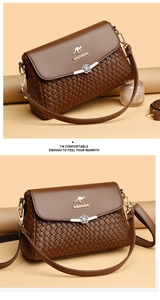 Close-up of woven leather texture and metal flower buckle on dark brown shoulder bag