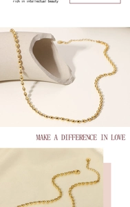 Detail of 18K gold plated oval bean chain with lobster clasp and adjustable link