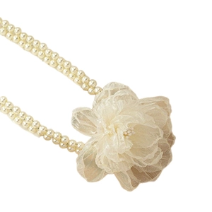 Elegant multi-layer pearl necklace with a detailed off-white chiffon flower decoration