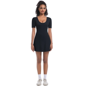 Slim fit black tennis dress with scoop neck and short sleeves on a white background