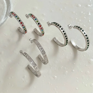 Exaggerated C-shaped geometric hoop earrings in stainless steel with colorful rhinestones