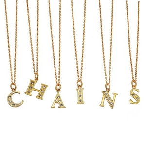 Golden titanium steel 26 letter necklaces set with sparkling crystals for women