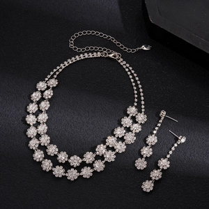 Silver flower necklace and earrings set with sparkling rhinestones for women