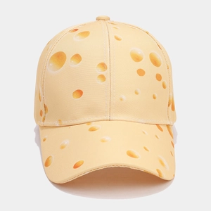 Pale yellow baseball cap with cheese pattern print, featuring a classic curved brim