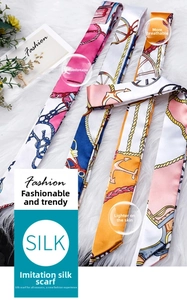 Detail of nautical print twilly silk scarves on faux fur with anchor and rope patterns