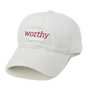 Detail of embroidered 'worthy' lettering on vintage washed cotton baseball cap