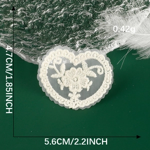 Detailed view of white heart lace embroidery patch showing 4.7x5.6 cm dimensions