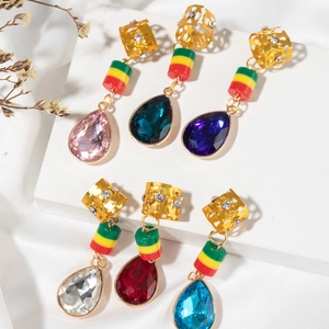 Golden dreadlock jewelry accessories with colorful crystal teardrop pendants and beads