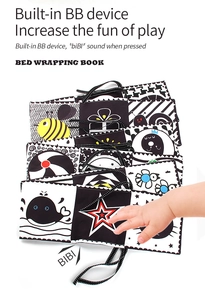 Detail of high contrast black and white baby cloth book with built-in squeaker device