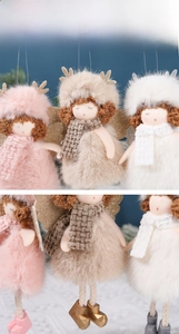 Close-up of plush angel Christmas tree ornaments with soft fur and sequined wings
