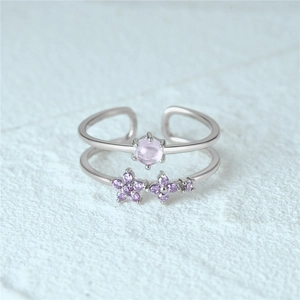 Detail of S925 silver double-layer open ring with pink gem and purple floral stones