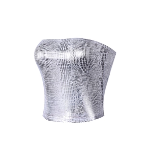 Detail of silver metallic tube top featuring embossed python snakeskin texture and shine