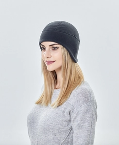 Close-up of charcoal grey fleece winter cycling cap with ear protection for cold weather
