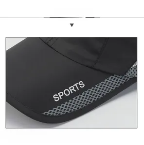 Detail view of sports cap brim with white SPORTS text and breathable grey mesh fabric
