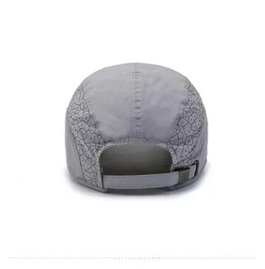 Grey quick-dry sun hat featuring laser-cut ventilation holes and adjustable back buckle