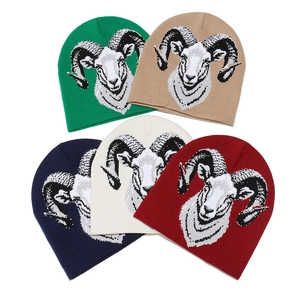 Winter knitted sheep jacquard beanies in forest green, navy, and khaki colors