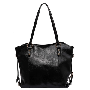 Chic black PU leather tote bag with distressed texture and stylish gold metal hardware