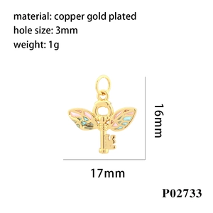 Detail of 18K gold plated key pendant with pink and blue wings and size specifications