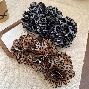 Floral leopard print hair clips in brown and grey chiffon with layered petal design