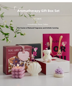 Close-up of Mother's Day scented candle gift set with bear and heart shaped candles
