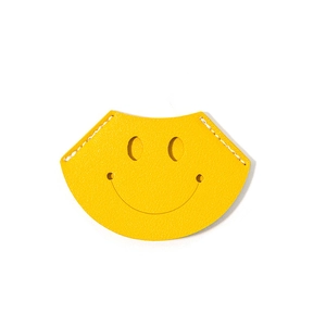 Yellow leather bookmark and tool protective sleeve with a smiling face stamped design