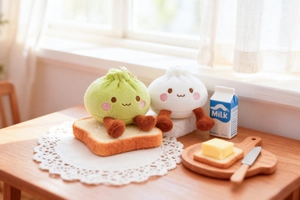 Close-up of cute plush bun charms with soft fur, embroidery details and golden chains