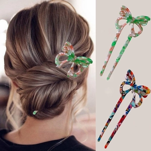 Elegant acetate butterfly hair pin with marble texture for traditional updo hairstyles