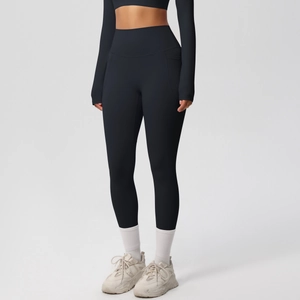 Close-up of high-waisted black yoga set with breathable double-sided brushed fabric