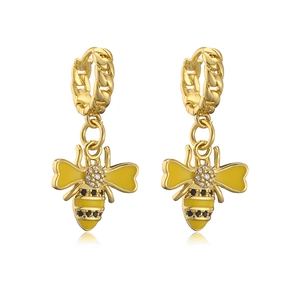 Detailed close-up of 18K gold plated bee earrings with yellow enamel and zircon stones