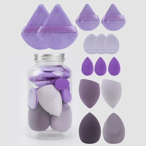 14-piece purple makeup sponge set with teardrop blenders and puff in storage jar