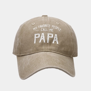 Detailed close-up of khaki washed cotton baseball cap with My Favorite People Call Me Papa text