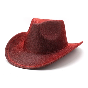 Macro shot of bright red cowboy hat with high-density glitter surface and wide brim