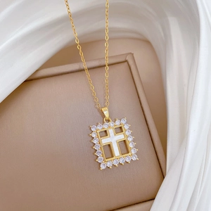 Elegant gold titanium necklace with a square cross pendant and sparkling zircon stones