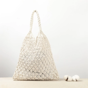 Handmade cream cotton rope woven tote bag with hollow grid design and artistic rustic accents