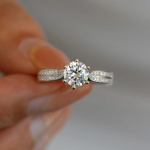 Classic six-prong moissanite ring in S925 sterling silver worn on finger