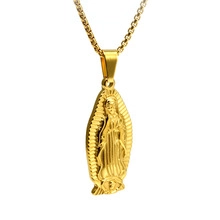 Detailed close-up of 18K gold-plated Virgin Mary Guadalupe pendant with embossed texture