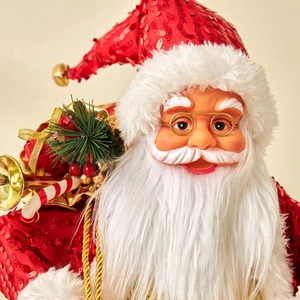 Standing Santa Claus doll in red sequined suit with white beard and gift bag decoration