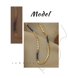 Detailed macro view of handcrafted titanium steel necklace with blue natural stone beads