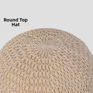 Detailed macro shot of the round crown on a breathable knitted summer bucket hat