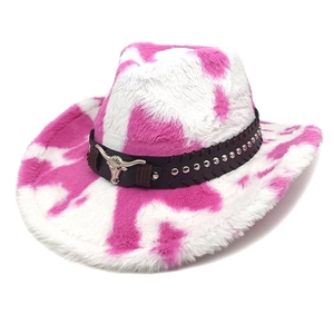 Pink and white cow print plush western cowboy hat with studded band and silver bull icon
